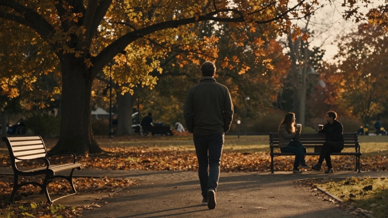 Two distant figures chatting peacefully in Victoria Park at sunset, evoking quiet human connection.