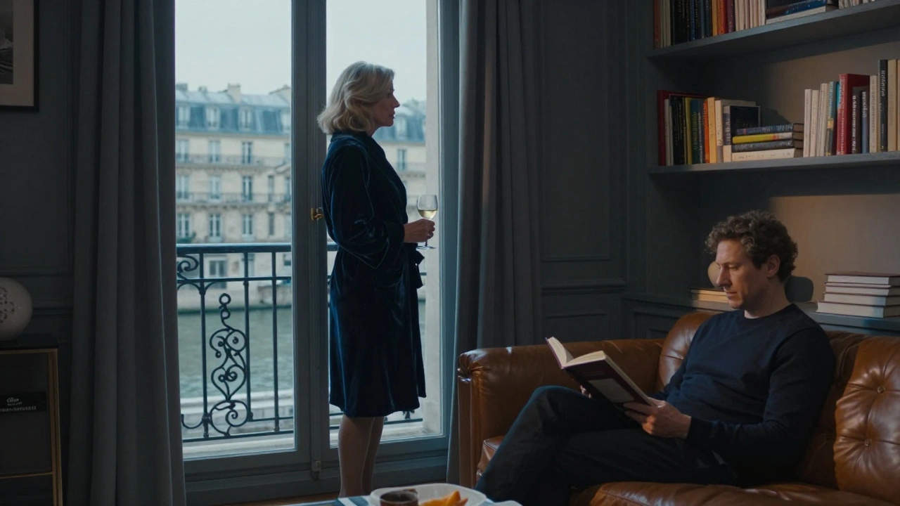 A woman in an elegant apartment overlooking the Seine, holding a glass of wine as a man reads nearby.
